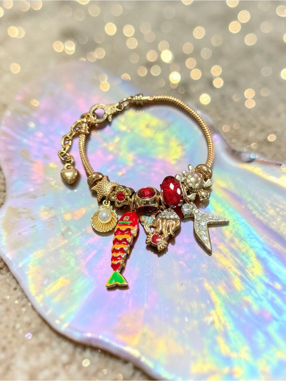 Gold-Tone Red Charm Bracelet with Fish & Shell Charms